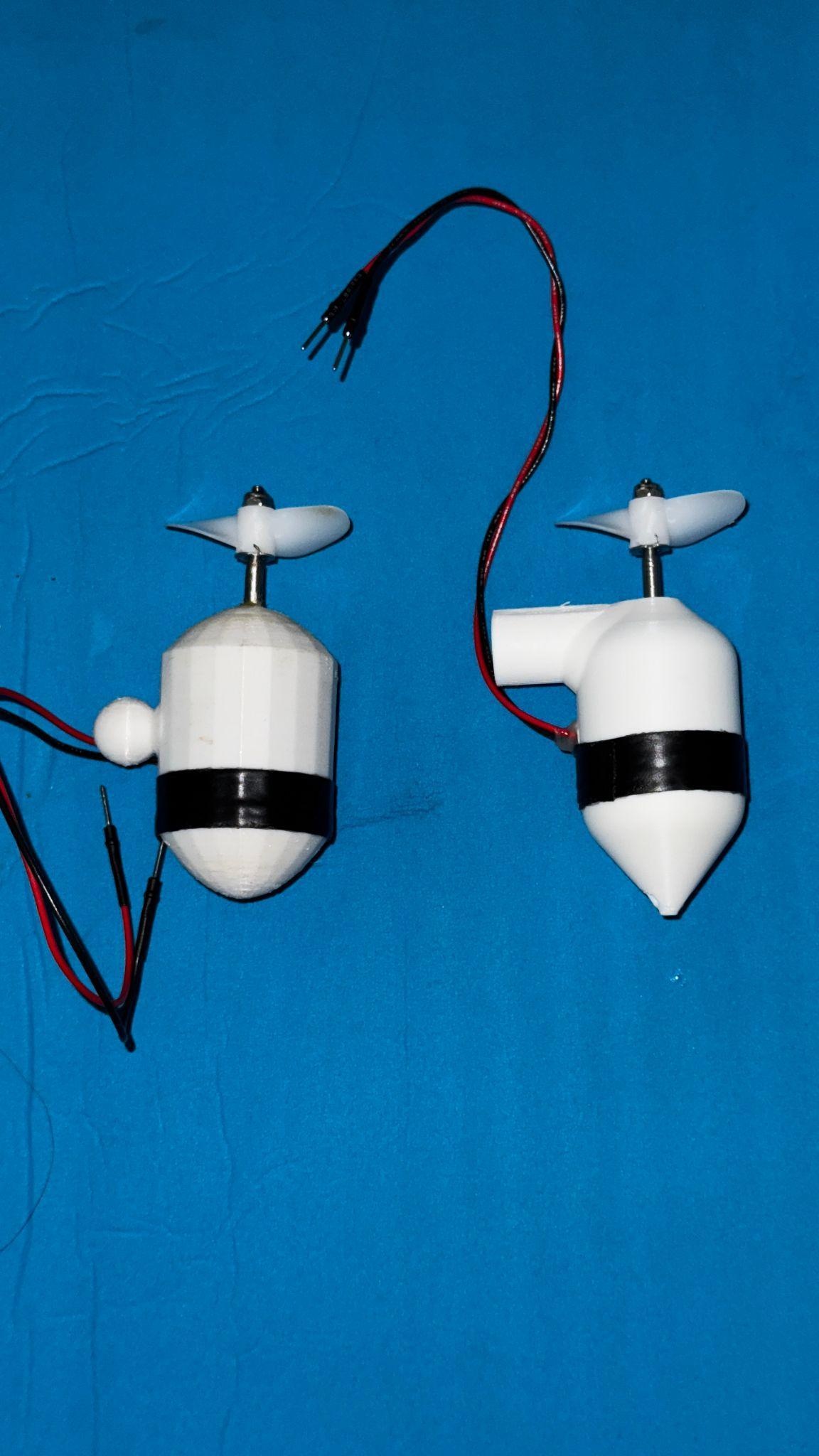 Generation 5 and Generation 5.5 motor assemblies photographed side by side